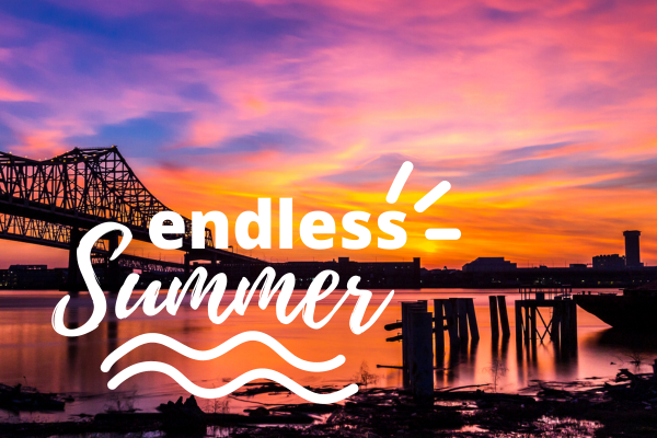 A sunset over a city skyline with a prominent bridge is seen. The text 